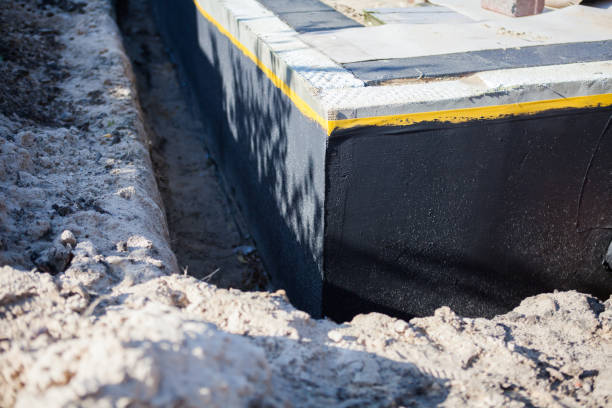 Professional Waterproofing technician working in Cedarburg, WI